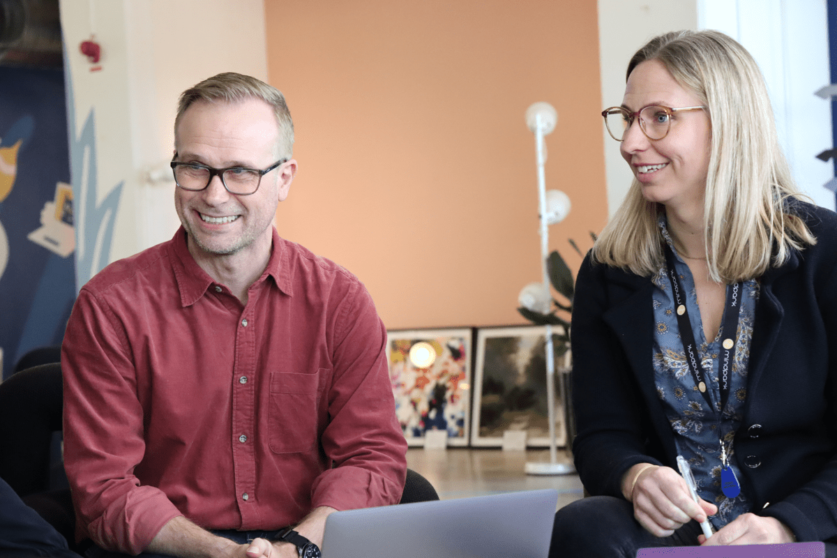 Two Contentor colleagues working together in the office